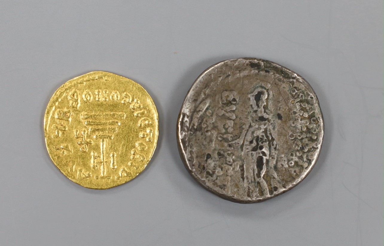 A Heraclius gold solidus, 610-641 AD, 4.4 grams and a silver Tetradrachm, 12.4g